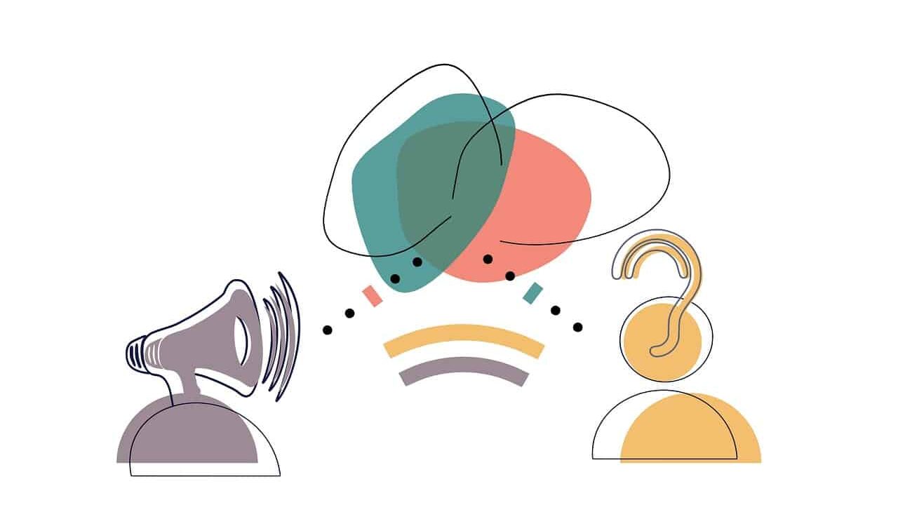 Ilustração abstrata representando o conceito de comunicação. À esquerda, há um megafone estilizado em tons de cinza, simbolizando a emissão de som ou mensagem. À direita, há uma figura amarela estilizada com uma orelha grande, representando a recepção de som ou da mensagem. No espaço entre os dois, várias formas geométricas e linhas abstratas, como círculos pretos, quadrados coloridos e curvas, criam uma composição dinâmica que simboliza o fluxo de informações.